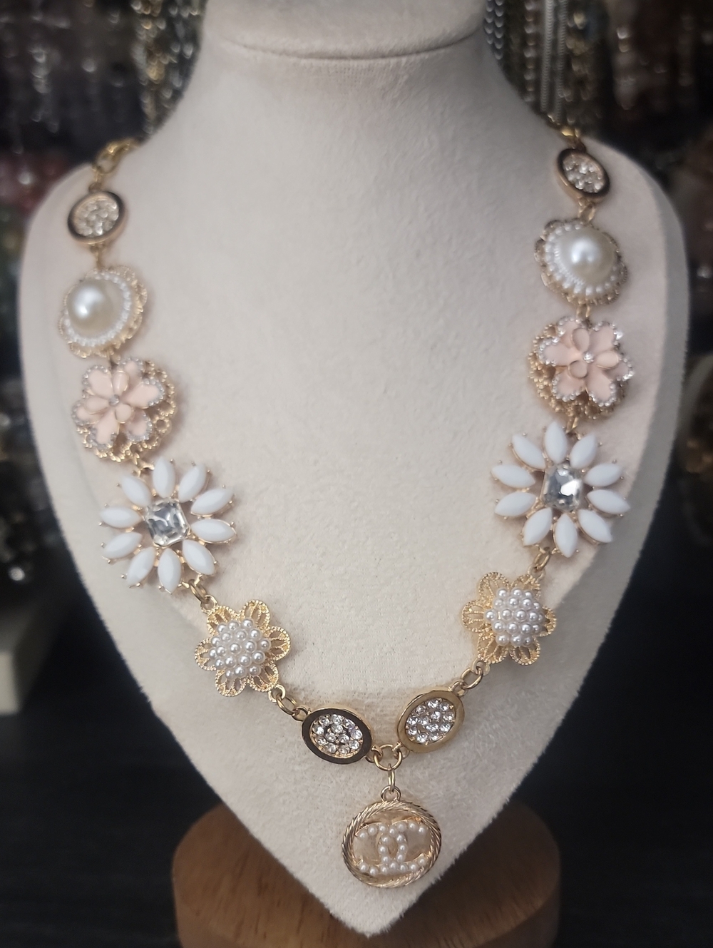 Elegant CC Charm Gold Floral Necklace with White and Blush Accents